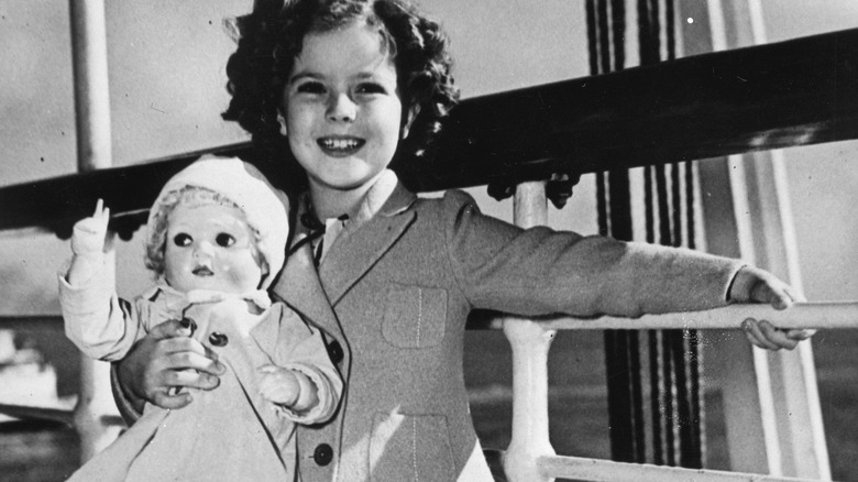 Shirley Temple with a doll
