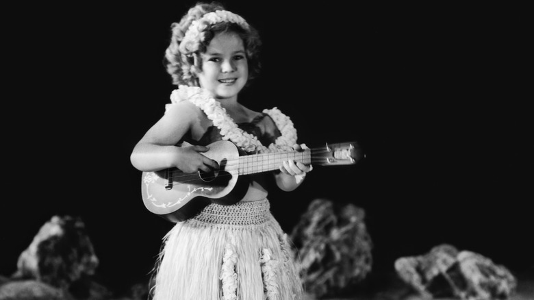 Shirley Temple with a ukelele