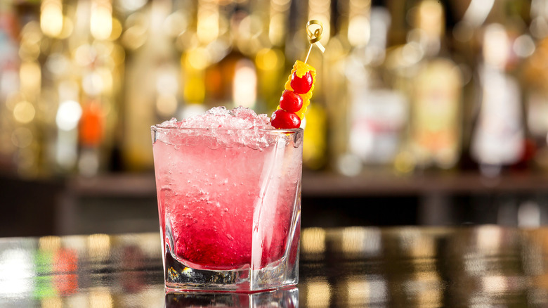 A Shirley Temple drink on a bar