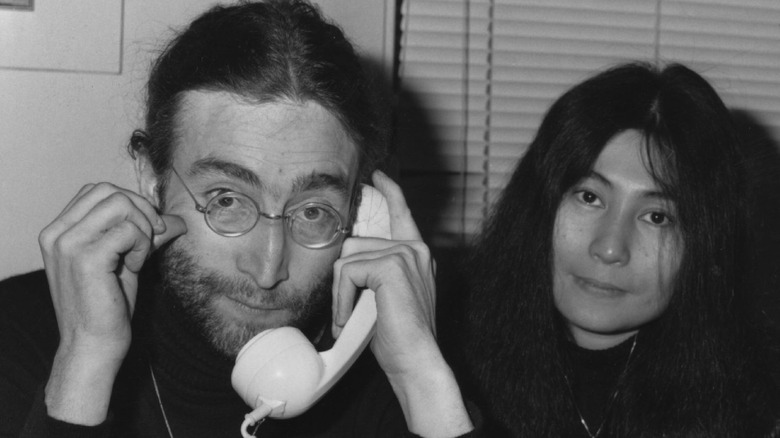 John Lennon making a phone call