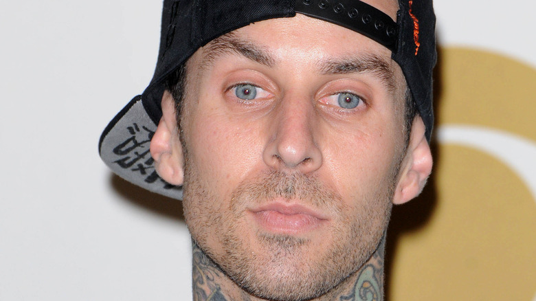 Travis Barker backwards baseball cap