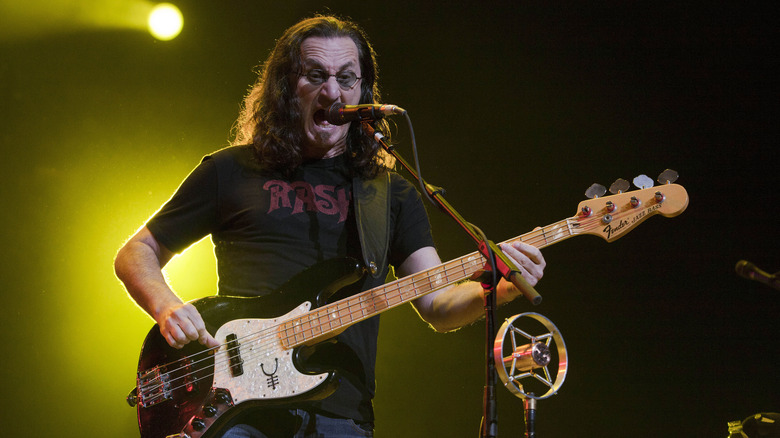 Geddy Lee performing on stage