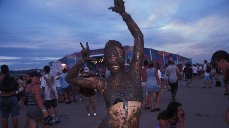 Mud person posing at Woodstock 99
