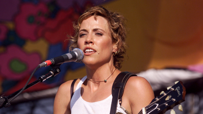 Sheryl Crow performing at Woodstock 99