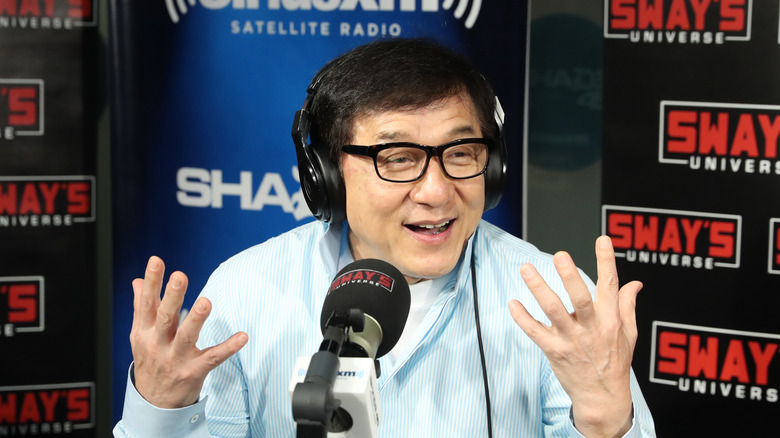 Jackie Chan sporting headphones