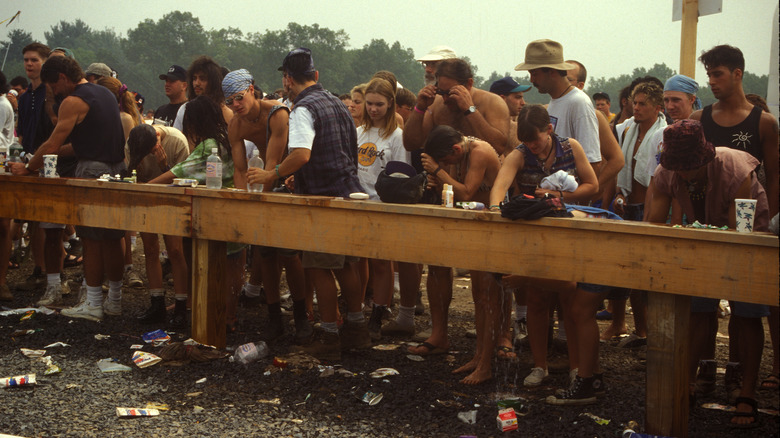 People washing themselves Woodstock 99