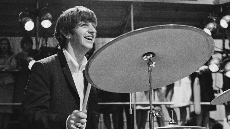 Ringo Starr playing drums in the Beatles