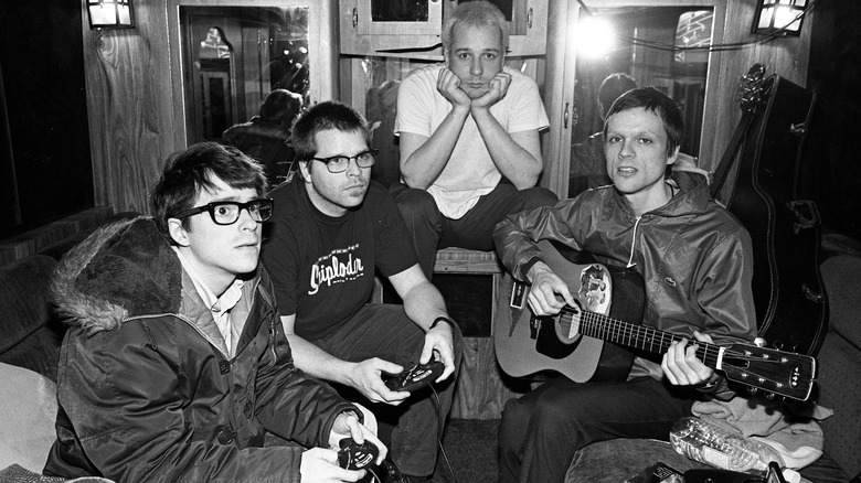 Weezer posing backstage