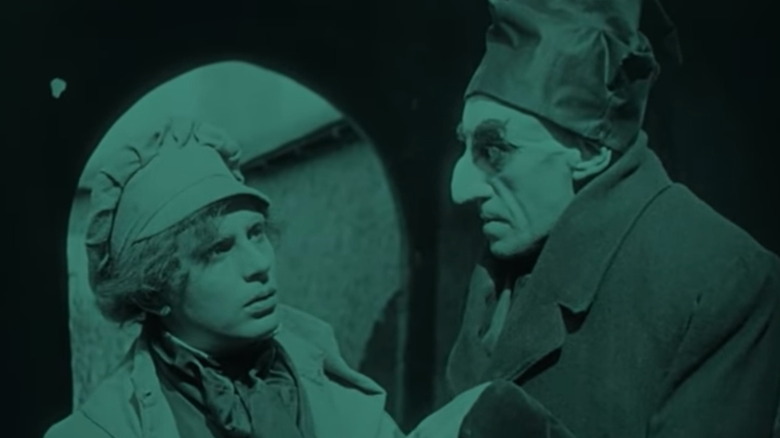 Gustav von Wangenheim as Hutter meeting Orlok