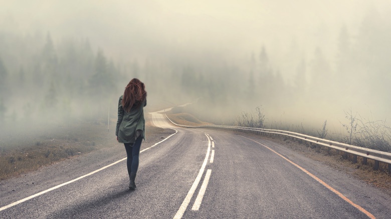 Woman alone on highway