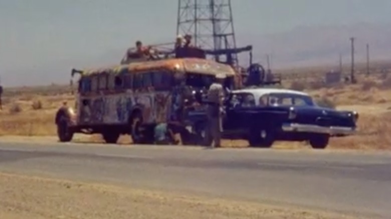 Police officer pulling over the Pranksters