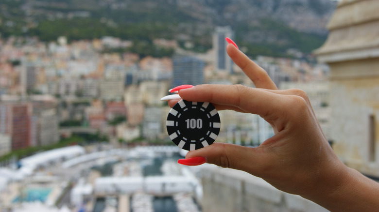 casino chip and Monaco countryside