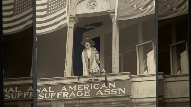 A photograph of young Jeannette Rankin fighting for women's suffrage