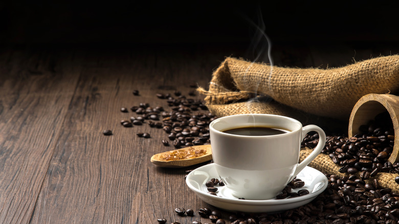 Coffee cup and coffee beans