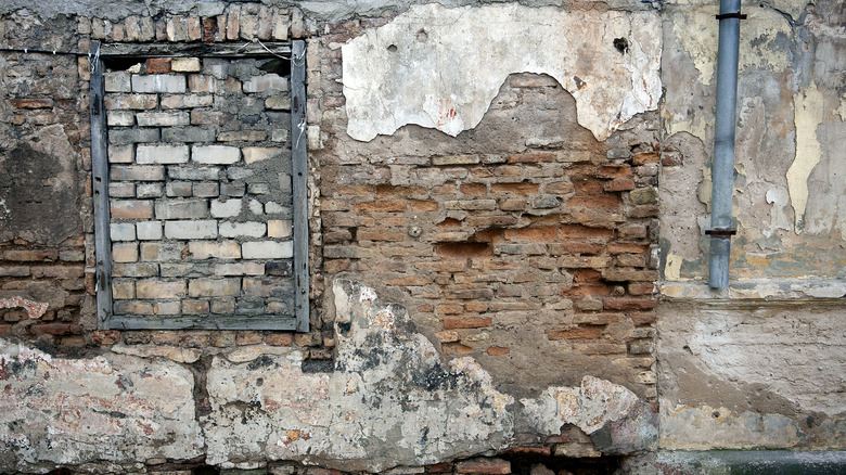 window covered with bricks