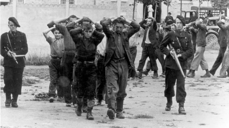 Cropped photo of members of the French Resistance captured by French militiamen working for the Nazis from the German Federal Archive