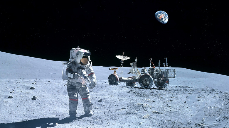 An astronaut and a moon buggy