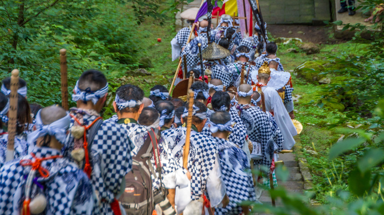 Yamabushi mountain priests walking a trail