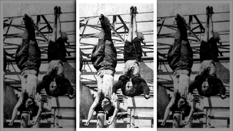 Mussolini and Petacci strung up in the Piazzale Loreto