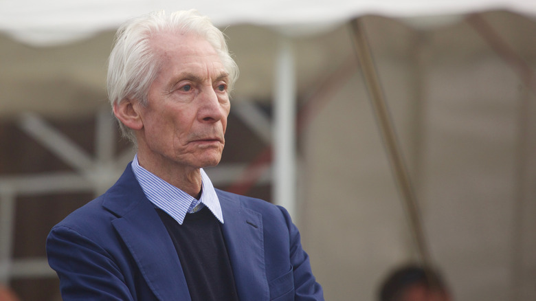 Charlie Watts wearing a suit