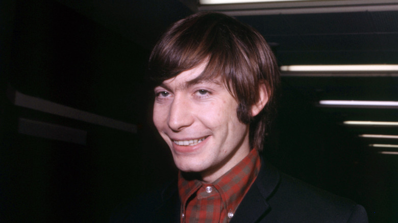 Young Charlie Watts smiling