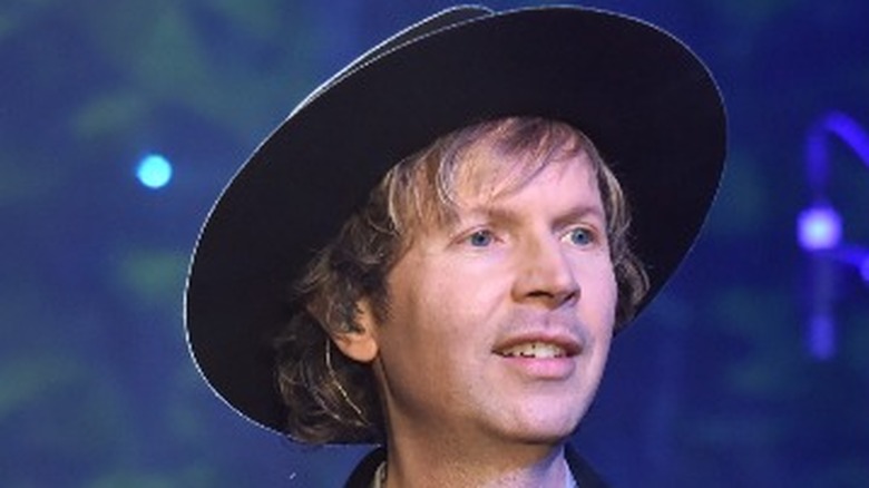 Beck wearing hat