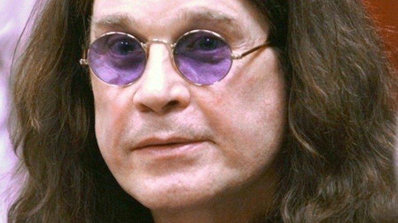 Ozzy Osbourne purple glasses