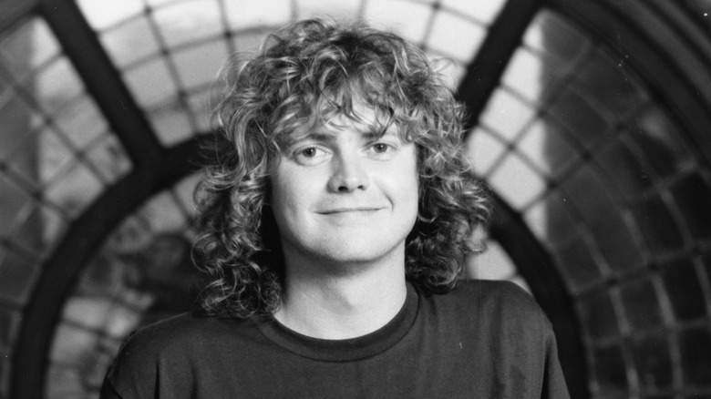 Rick Allen smiling long hair 1987