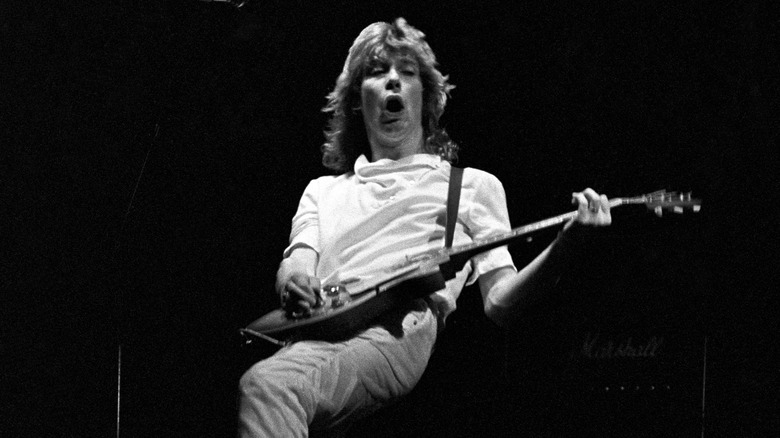 Steve Clark performing on stage