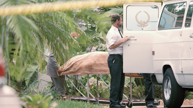 Gianni Versace's body being transported