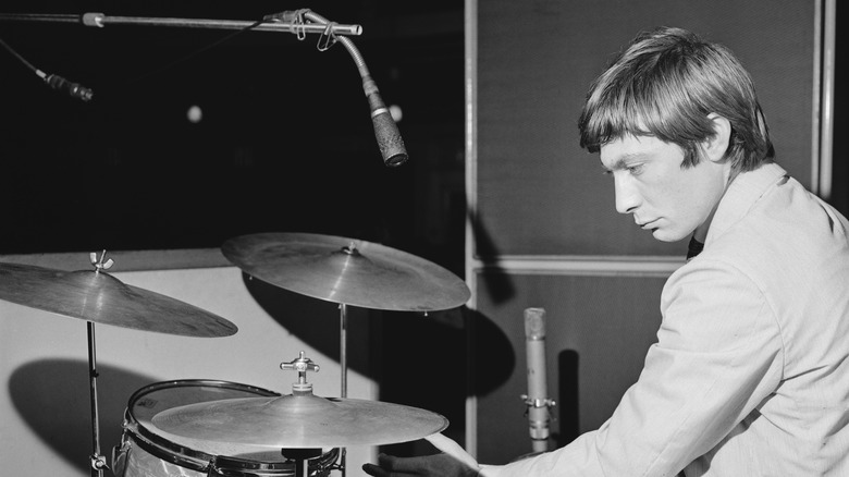 young Charlie Watts at his drum set