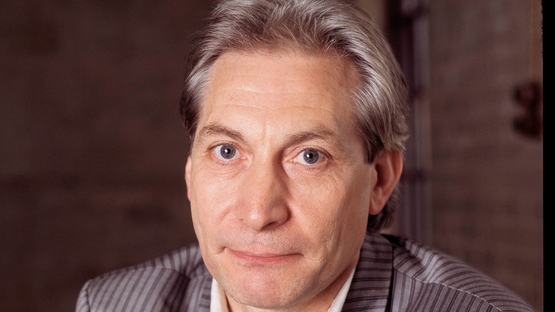 Charlie Watts wearing striped suit