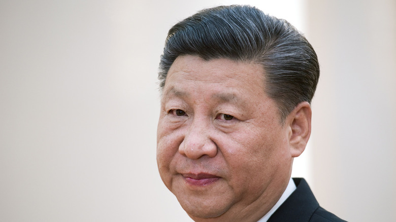 Xi Jinping pursing lips