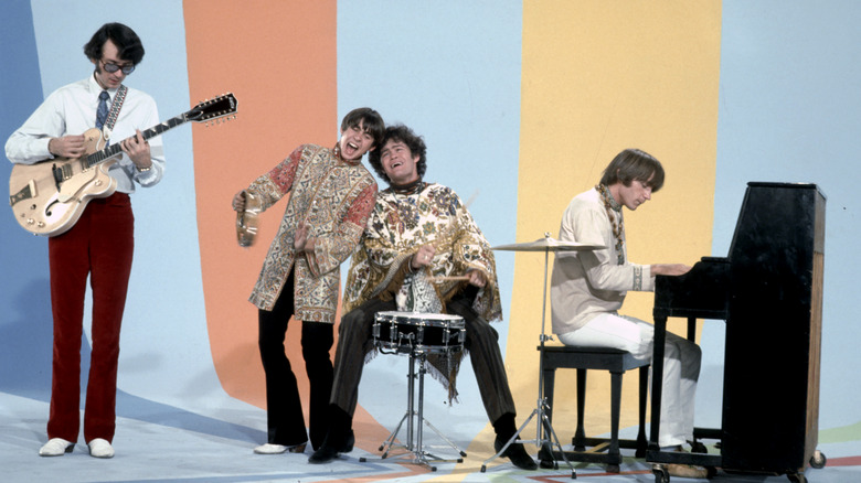 The Monkees performing in a studio