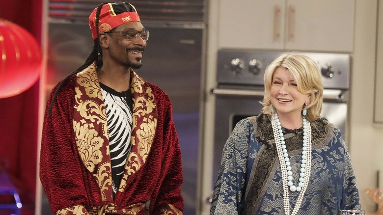 Snoop Dogg and Martha Stewart smiling in kitchen