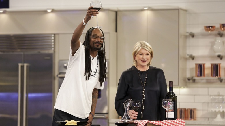 Snoop Dogg and Martha Stewart giving a toast