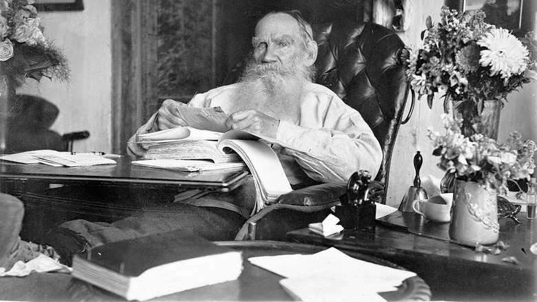 Leo Tolstoy working in his office