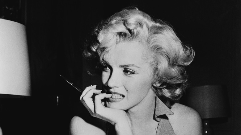 Marilyn Monroe biting nails