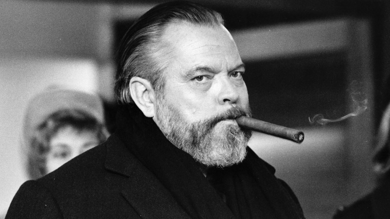 Orson Welles with cigar in mouth
