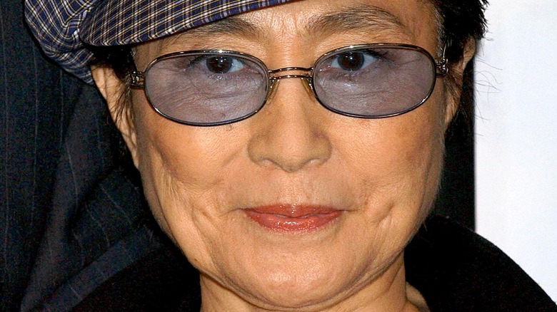 Yoko Ono in oval glasses