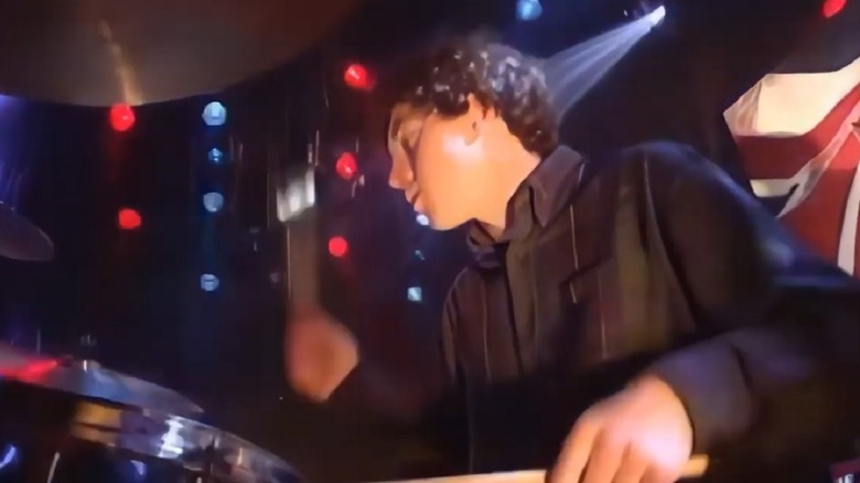 Tony Caroll performing on Top of the Pops with Oasis in 1994