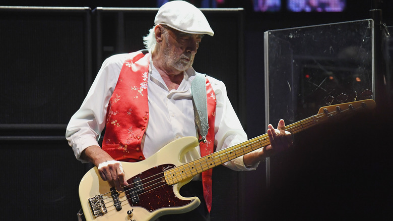 John McVie playing guitar