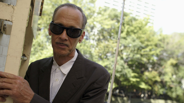 John Waters in sunglasses