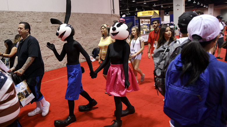 People dressed as Oswald the Lucky Rabbit and Ortensia