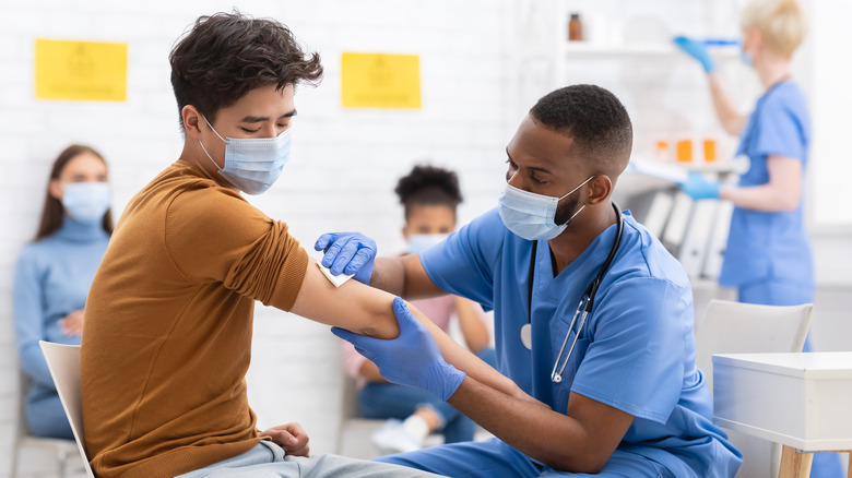 Nurse preparing to administer vaccine