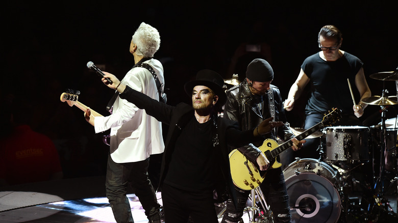 U2 playing on stage