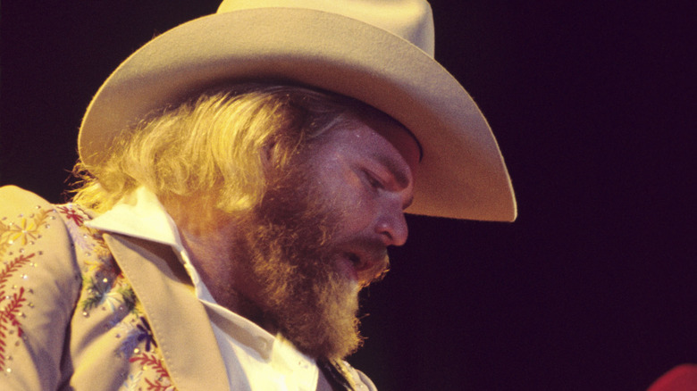 Young Dusty Hill playing bass