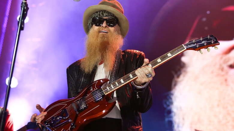 Billy Gibbons holding guitar