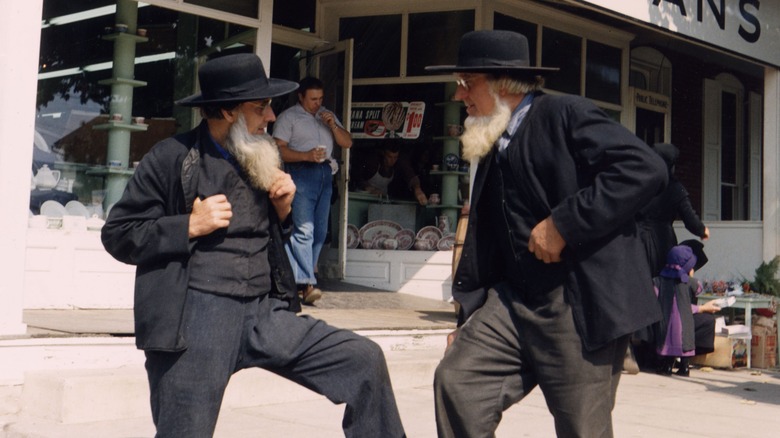 Amish men speaking in town