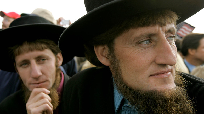 Amish men in a crowd
